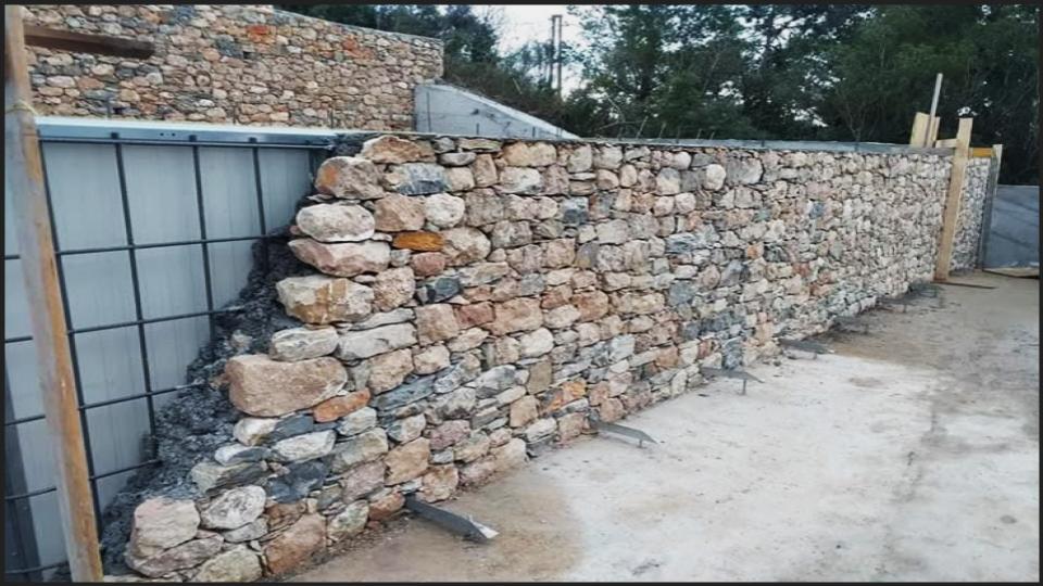 The Rustic Stacked Stone or Gabion Wall